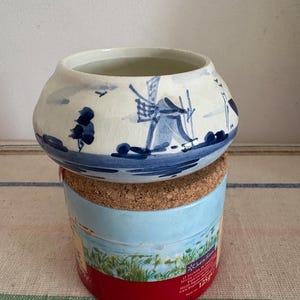 A beautiful vintage  Delft Blue Dutch  Holland china hand painted blue and white trinket dish with windmill scene