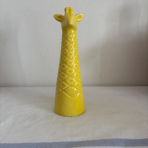 An unusual yellow ceramic giraffe posy vase / stem vase