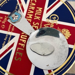 A fun  retro Brecon souvenir loose tea caddy spoon or scoop