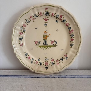 Beautifully hand painted, &#39;Decor Main&#39; antique 10.5&quot; diameter Moustiers Faience plate with boy playing a lute