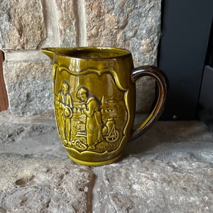 A  lovely antique Poet Laval Angelus Provence France olive green  Majolica  Hound Handle Jug / Pitched