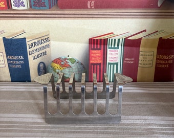A  retro vintage  six slice stainless steel   toast rack