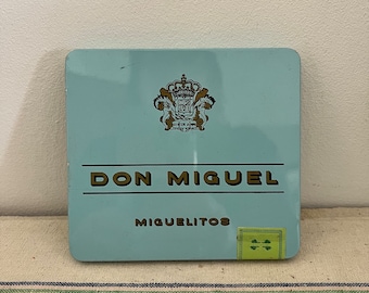 An original vintage 1980s  Dutch Don Miguel Miguelitos duck egg blue and gold  cigar tin with original paper