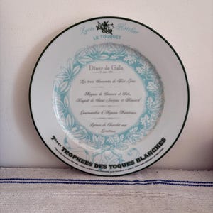 A white porcelain plate by Pillivuyt porcelain to commemorate The Gala Dinner 1995 of the Lycee Hotelier - Le Touquet