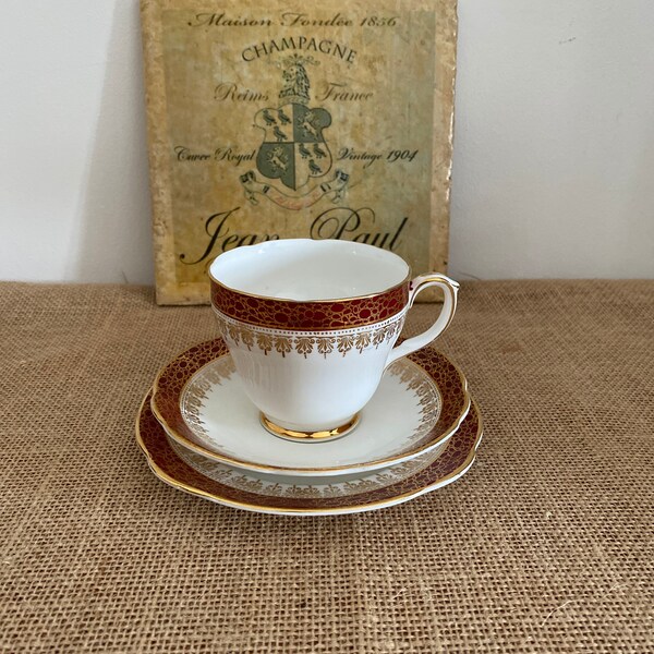 Lovely vintage 1950s maroon red and gold   Duchess Winchester  bone china trio of  matching cup, saucer and  plate