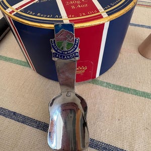 A retro Callander souvenir loose tea caddy spoon or scoop