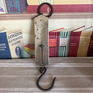 An antique  brass Salter Spring Balance weighing scales