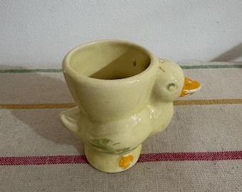A Collectible Set of Three Foreign Stamped Porcelain Egg