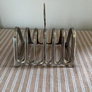 A vintage silver plated six slice toast rack to brighten up your breakfast table