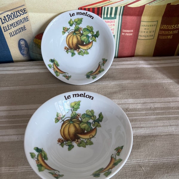 A  very pretty pair of French Vintage L'Hirondelle porcelain melon bowls