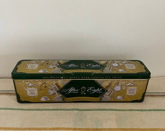 A used empty limited edition After Eight tin for dressing, storage, chocolates