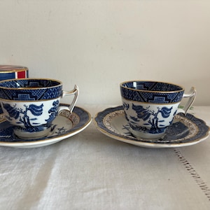 A pair of  A8025 Booths Real Old Willow blue, white and gold Espresso small coffee  cup and saucer  design