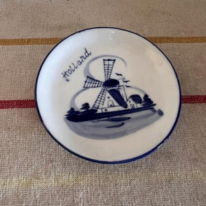 A beautiful vintage  Delft Blue Dutch  Holland china hand painted blue and white trinket dish with windmill scene