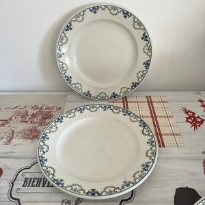 A pair of well used French antique  early 20th century century 8.5&quot;  St Amandinoise St Amand  plates  with a pretty garland design