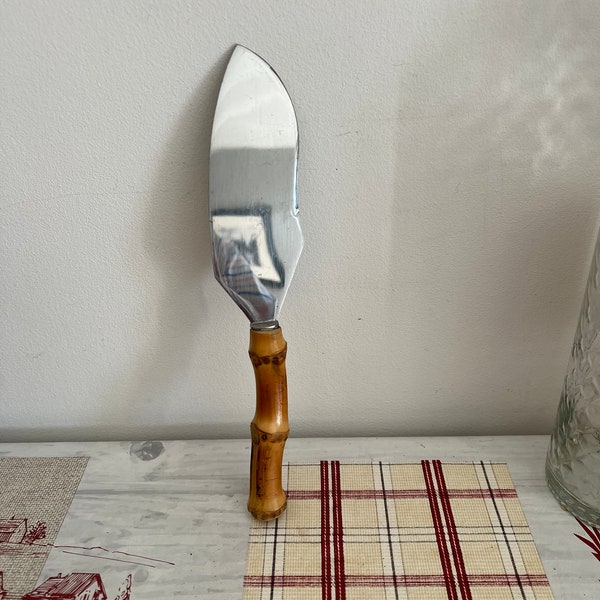 A well made Martin Pecheur  vintage stainless steel  Inox Depose cake knife with a natural cane handle