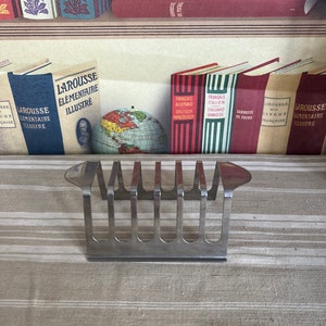 A  retro vintage  six slice stainless steel toast rack