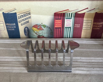 A  retro vintage  six slice stainless steel toast rack