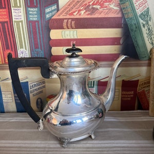 An impressive tall elegant antique Viners Alpha plate  coffee pot  with an ebonised  wooden handle and finial and  hinged lid