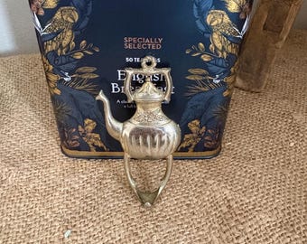 A lovely French vintage teapot design coat hook ideal for tea towel or hand towel