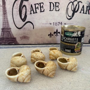 A traditional set of  6 French vintage oven proof individual ceramic snail dishes