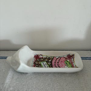 A fun long French vintage white illustrated ceramic  pig saucisson plate