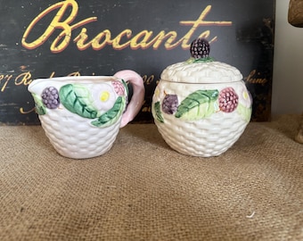 A  Portuguese vintage Secla Majolica lidded jam pot and creamer - floral, berry raised embossed design