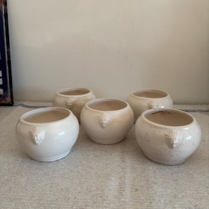 A rare set of five small sized hand made  France vintage earthenware  French onion soup bowls with with lion  head handles