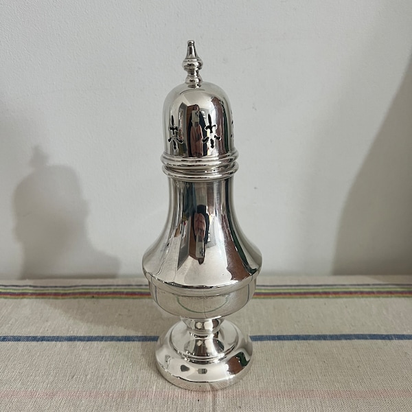 A gorgeous Lanson Ltd  EPNS silver plated sugar caster, mufineer, shaker with a Fleur de Lys design