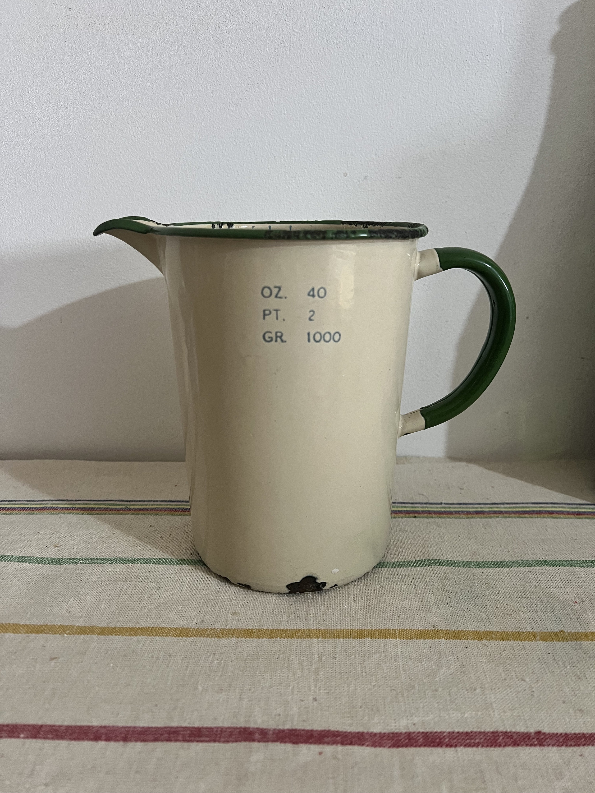 1940’s WW2 vintage enamelled beige and green  2 pint  jug. Can be used to store kitchen utensils or flowers
