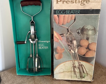 Ein unglaublicher Zustand, original verpackt, Vintage-Retro-Prestige-Edelstahl-Schneebesen mit Teak- und Kunststoffgriffen