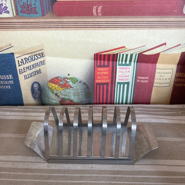 A  retro vintage  18-8 stainless steel 'Made in Hong Kong'  1960s toast rack with slide on crumb tray