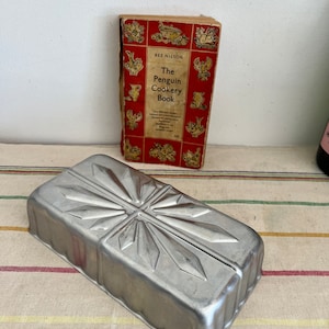 A  vintage French aluminium cooking, terrine, ice cream, pate,  loaf, brioche, jelly mould
