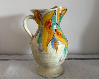 A stunning vibrant coloured  example of a hand painted  Art Deco  Beswick  Ware Ruth 72  jug pitcher vase with handle