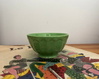 A cute Moulin des Loups Orchies pea green speckled small bowl for trinkets, olives, nuts