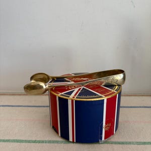 A lovely large Monogrammed  pair of British  EPNS antique silver plated   sugar tongs