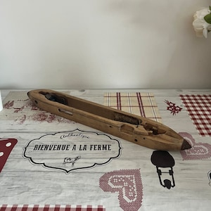 A beautiful solid wood French antique weaving boat shuttle