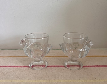 A French  vintage Luminarc pair of matching chicken design glass egg cups