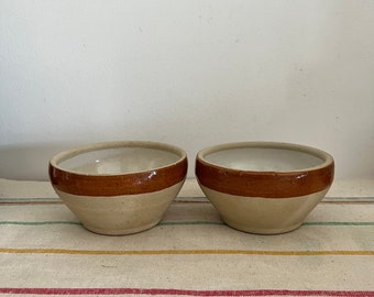 A vintage  rustic pair of French earthenware caramel honey coloured bowls, dishes, soup bowls