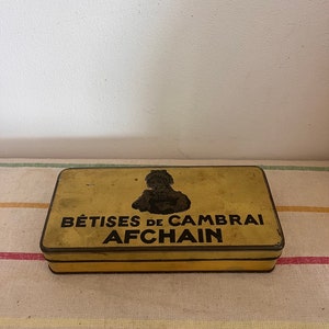 An original French vintage Betises de Cambrai Afchain lidded tin
