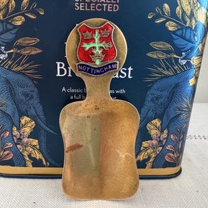 A retro Nottingham brass loose  tea caddy spoon or scoop