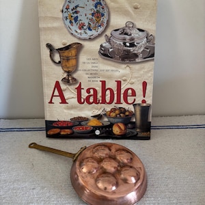 A vintage French antique copper snail  pan with brass handle