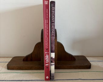A pair of retro sixties dark wood veneer  book ends with green felt lining