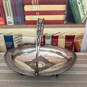 A 19th century Dixon antique retro silver oval  fruit  or bread basket with fold down handle on feet
