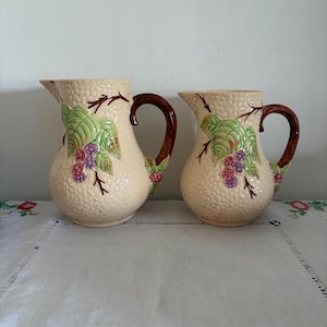 A  pair of  beautiful 1950s WADE Pottery  Bramble Design hand painted  jugs pitchers
