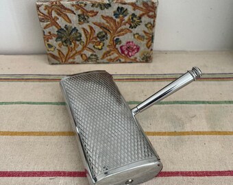 A beautiful antique  French  chrome plated table crumb brush sweeper in its original floral cardboard box