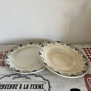 A pair of very well used French antique  early 20th century century 8.5&quot;  St Amandinoise St Amand  plates  with a pretty garland design