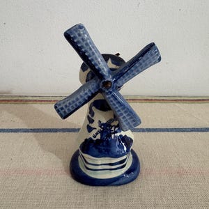 An antique Delft Blue  Dutch Holland china hand painted blue and white windmill ornament