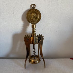 An original retro brass Mediolani historical  Italian brass   Corkscrew -