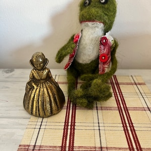 A petit antique vintage brass Victorian  lady crinoline dress hand  ringing bell