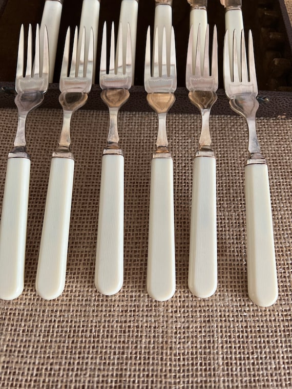 Bundle of various vintage fish knives and forks with faux bone handles  delivered